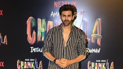 Bollywood heartthrob Kartik Aaryan was a sight for sore eyes. He kept it cool and casual in a striped shirt with a couple of top buttons left open, looking handsome as ever. He completed the look with pristine white sneakers Bollywood heartthrob Kartik Aaryan was a sight for sore eyes. He kept it cool and casual in a striped shirt with a couple of top buttons left open, looking handsome as ever. He completed the look with pristine white sneakers