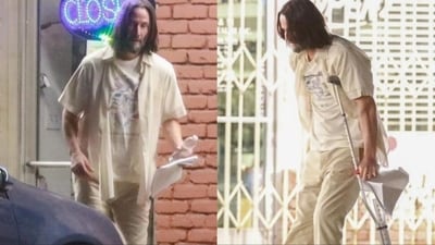 A fan account shared photos of Keanu Reeves walking with crutches earlier this year. A fan account shared photos of Keanu Reeves walking with crutches earlier this year.