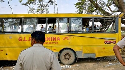 Haryana bus accident: Locals near a damaged school bus after an accident near Mahendragarh in Narnaul district. (PTI) Haryana bus accident: Locals near a damaged school bus after an accident near Mahendragarh in Narnaul district. (PTI)