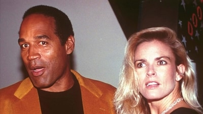 FILE - O.J. Simpson and his wife, Nicole Brown Simpson, arrive for the opening of the Harley-Davidson Cafe in New York on Oct. 19, 1993. Simpson, (AP) FILE - O.J. Simpson and his wife, Nicole Brown Simpson, arrive for the opening of the Harley-Davidson Cafe in New York on Oct. 19, 1993. Simpson, (AP)
