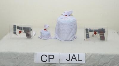 The Jalandhar commissionerate police busted a cross-border drug trafficking racket by arresting an associate of slain gangster Jaipal Bhullar with 3kg heroin and two illegal weapons. (HT Photo)