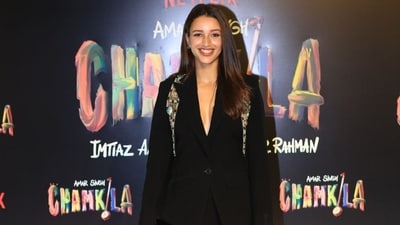 Triptii Dimri turned heads in a risque power suit. Her black blazer, featuring a dangerously plunging neckline, was heavily embellished near the shoulders adding an edge to her stylish OOTD Triptii Dimri turned heads in a risque power suit. Her black blazer, featuring a dangerously plunging neckline, was heavily embellished near the shoulders adding an edge to her stylish OOTD