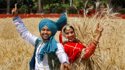 Be it Poila Boishak in West Bengal or Puthandu in Tamil Nadu or Ugadi in Karnataka, Andhra Pradesh and Telangana, to Baisakhi in Punjab, people bask in festivities and welcome the spring harvest festival with open arms. (PTI) Be it Poila Boishak in West Bengal or Puthandu in Tamil Nadu or Ugadi in Karnataka, Andhra Pradesh and Telangana, to Baisakhi in Punjab, people bask in festivities and welcome the spring harvest festival with open arms. (PTI)