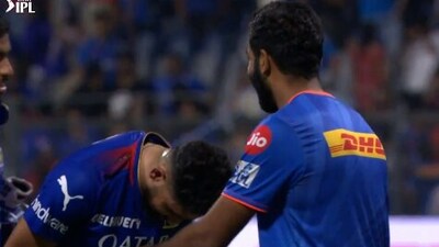 Mohammed Siraj (L) bows down to Jasprit Bumrah after MI vs RCB match (IPL) Mohammed Siraj (L) bows down to Jasprit Bumrah after MI vs RCB match (IPL)