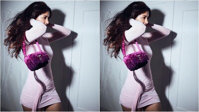 Assisted by celebrity fashion stylist Devki Bhatt, Disha accessorised her look with multiple silver rings adorning her fingers, a bright pink furry Jimmy Choo shoulder bag and a pair of high heels to complement her chic look. (Instagram/@dishapatani) Assisted by celebrity fashion stylist Devki Bhatt, Disha accessorised her look with multiple silver rings adorning her fingers, a bright pink furry Jimmy Choo shoulder bag and a pair of high heels to complement her chic look. (Instagram/@dishapatani)