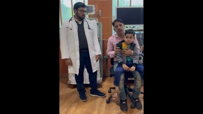 Dr Rishi Raman (left) removed the ₹5 coin from the boy's throat and prevented a tragedy. (X/@Moolchand_Hosp) Dr Rishi Raman (left) removed the ₹5 coin from the boy's throat and prevented a tragedy. (X/@Moolchand_Hosp)
