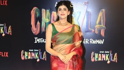 Sanjana Sanghi was also spotted at the special screening in Mumbai, which was attended by many celebs from the film fraternity. She wore a beautiful red and orange saree for the Amar Singh Chamkila screening. 