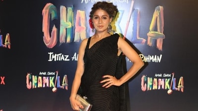 Sunidhi Chauhan also turned up in a saree for the Amar Singh Chamkila screening in Mumbai on Thursday. The singer added red flowers to her hair as she posed on the red carpet in her black saree look. 