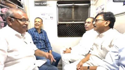 Uddhav Thackeray seen travelling in a Mumbai local train post his visit to Palghar on Friday. (X/Shiv Sena UBT) Uddhav Thackeray seen travelling in a Mumbai local train post his visit to Palghar on Friday. (X/Shiv Sena UBT)