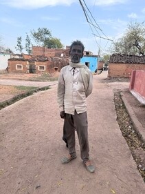 Listless Kallu Ahirwar has little else to do but watch over his barren farm and wait for his two sons to return. Listless Kallu Ahirwar has little else to do but watch over his barren farm and wait for his two sons to return.