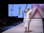 A model presents a creation, co-created by a designer working for Dior and several other Serbian designers, based on drawings of dresses by Angelina Acimovic, who was among the victims of an unprecedented Belgrade elementary school mass shooting last May, during a Fashion Week in Belgrade Serbia, 