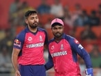 Rajasthan Royals' captain Sanju Samson, right, and Avesh Khan Rajasthan Royals' captain Sanju Samson, right, and Avesh Khan