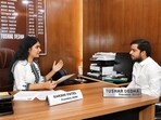 DUSU’s acting president Sakshi Patel in conversation with sitting president Tushar Dedha.