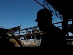 An employee works at a thermal power plant. REUTERS/Valentyn Ogirenko