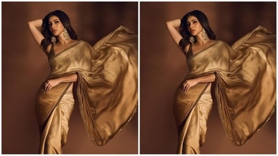 On Friday, Mouni gave her fans a sweet surprise as the actress took to Instagram and uploaded a series of stunning pictures accompanied by the caption "My front row cliché". In the post, she can be seen looking like an ethereal princess in a golden saree. (Instagram/@imouniroy) On Friday, Mouni gave her fans a sweet surprise as the actress took to Instagram and uploaded a series of stunning pictures accompanied by the caption "My front row cliché". In the post, she can be seen looking like an ethereal princess in a golden saree. (Instagram/@imouniroy)