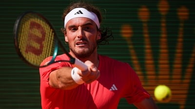 Stefanos Tsitsipas, of Greece, returns the ball to Jannik Sinner, of Italy (AP) Stefanos Tsitsipas, of Greece, returns the ball to Jannik Sinner, of Italy (AP)