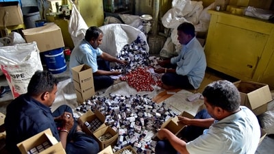 Workers pack indelible ink vials that are used during elections to prevent duplication of voting, at the government-run Mysore Paints and Varnish company in Mysuru, India, March 12, 2024. REUTERS/Rakesh Nair (REUTERS)