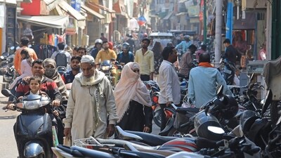 In this picture taken on March 14, 2024, people make their way through a busy market area near the Jama Masjid (mosque) at Rampur in India's Uttar Pradesh state. More than half the voters in India's city of Rampur are Muslim, but its member of parliament is a staunch supporter of Prime Minister Narendra Modi's muscular Hindu-first agenda. While India's 220 million Muslims make up 14 percent of the 1.4 billion population, Muslim representatives in parliament have almost halved to under five percent since the 1970s. (Photo by AFP) / To go with India-vote-religion-Islam-rights, FOCUS by Parvaiz BUKHARI (AFP) In this picture taken on March 14, 2024, people make their way through a busy market area near the Jama Masjid (mosque) at Rampur in India's Uttar Pradesh state. More than half the voters in India's city of Rampur are Muslim, but its member of parliament is a staunch supporter of Prime Minister Narendra Modi's muscular Hindu-first agenda. While India's 220 million Muslims make up 14 percent of the 1.4 billion population, Muslim representatives in parliament have almost halved to under five percent since the 1970s. (Photo by AFP) / To go with India-vote-religion-Islam-rights, FOCUS by Parvaiz BUKHARI (AFP)