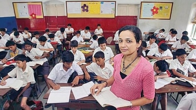 India, Mumbai...August 08, 2012... Sanjot ( Teacher ) teaching student at a school in Bandra, Mumbai, India on Wednesday, August 08, 2012... Photo by Kalpak pathak / Hindustan Times. (Hindustan Times) India, Mumbai...August 08, 2012... Sanjot ( Teacher ) teaching student at a school in Bandra, Mumbai, India on Wednesday, August 08, 2012... Photo by Kalpak pathak / Hindustan Times. (Hindustan Times)