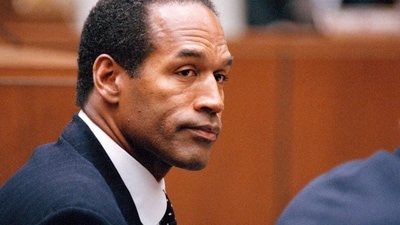 FILE - O.J. Simpson sits at his arraignment in Superior Court in Los Angeles on July 22, 1994, where he pleaded "absolutely, 100 percent not guilty" on murder charges. Simpson, the decorated football superstar and Hollywood actor who was acquitted of charges he killed his former wife and her friend but later found liable in a separate civil trial, died Wednesday, April 11, 2024, of prostate cancer. He was 76. (AP Photo/Pool/Lois Bernstein, Pool) (AP)