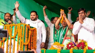 RJD leader and former Bihar deputy chief minister Tejashwi Yadav acknowledges supporters during an election rally in Jamui. (PTI file photo) RJD leader and former Bihar deputy chief minister Tejashwi Yadav acknowledges supporters during an election rally in Jamui. (PTI file photo)