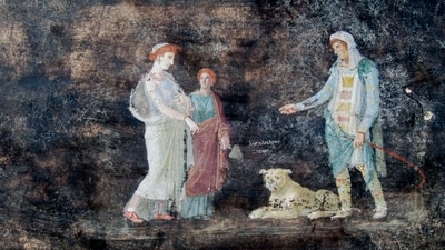 This image released by the Italian Culture Ministry on Wednesday shows a fresco depicting the Greek mythology figures of Helen, left, and Paris of Troy, right, inside an imposing banquet hall with elegant black walls. (AP) This image released by the Italian Culture Ministry on Wednesday shows a fresco depicting the Greek mythology figures of Helen, left, and Paris of Troy, right, inside an imposing banquet hall with elegant black walls. (AP)