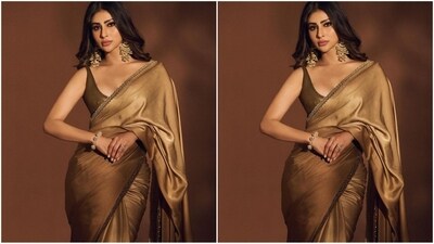 Assisted by celebrity fashion stylist Akshay Tyagi, Mouni accessorised her look with a pair of gold statement earrings, an elegant gold bracelet on her wrist, a multiple ring around her finger and a pair of golden high heels. (Instagram/@imouniroy) Assisted by celebrity fashion stylist Akshay Tyagi, Mouni accessorised her look with a pair of gold statement earrings, an elegant gold bracelet on her wrist, a multiple ring around her finger and a pair of golden high heels. (Instagram/@imouniroy)