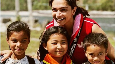 Deepika's picture from her Bhutan trip. It shows her hanging out with a few local kids. Deepika's picture from her Bhutan trip. It shows her hanging out with a few local kids. 