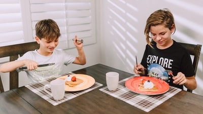 4. Make gradual changes to the child’s diet instead of completely revamping the meal plan. Replace a few unhealthy items in your kitchen with better alternatives, gradually incorporating more nutritious options over time that is white bread with multigrain bread, potato chips with sweet potato baked chips, ice cream with a smoothie, desserts or bakery items with homemade laddoos consisting of nuts, jaggery and dates. (Photo by RODNAE Productions) 4. Make gradual changes to the child’s diet instead of completely revamping the meal plan. Replace a few unhealthy items in your kitchen with better alternatives, gradually incorporating more nutritious options over time that is white bread with multigrain bread, potato chips with sweet potato baked chips, ice cream with a smoothie, desserts or bakery items with homemade laddoos consisting of nuts, jaggery and dates. (Photo by RODNAE Productions)