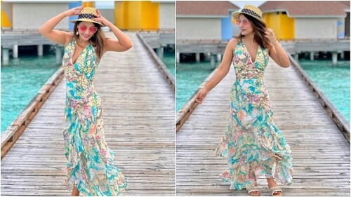 Hina Khan looks stunning in a floral printed maxi dress featuring a plunging V neckline, cinched waist, ruffled details, asymmetric hem, and a figure-skimming silhouette. (Instagram)