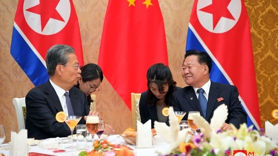 China's top lawmaker Zhao Leji (L) chatting with Choe Ryong Hae (R), chairman of North Korea's Standing Committee of the Supreme People's Assembly (AFP)
