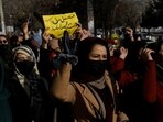 Afghan women chant slogans in protest of the closure of universities to women by the Taliban in Kabul, Afghanistan, December 22, 2022 