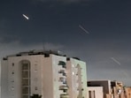 Israeli Iron Dome air defense system launches to intercept missiles fired from Iran, in central Israel, Sunday, April 14, 2024. Iran launched its first direct military attack against Israel on Saturday. 