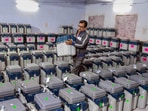 EVMs and other election material being kept at a distribution centre.