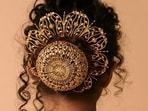 Embrace maximalism with intricate gold-plated hair accessories(Photo: Instagram)