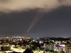 An anti-missile system operates after Iran launched drones and missiles towards Israel, as seen from Ashkelon, Israel 