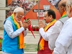 Prime Minister Narendra Modi being greeted by BJP National President JP Nadda on his arrival for the release of party's election manifesto.