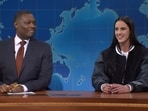 Michael Che and basketball champ Caitlin Clark on SNL's Weekend Update.