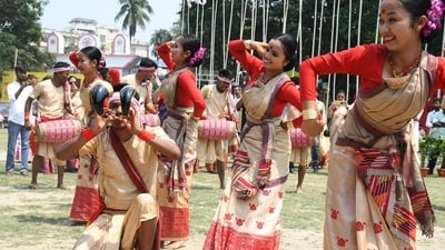 Artists in traditional Assamese Bihu dance during a function organized by Guwahati Bihu Sanmilian on the occasion of Rongali Bihu at Latashil playground in Guwahati on Saturday. (ANI) Artists in traditional Assamese Bihu dance during a function organized by Guwahati Bihu Sanmilian on the occasion of Rongali Bihu at Latashil playground in Guwahati on Saturday. (ANI)