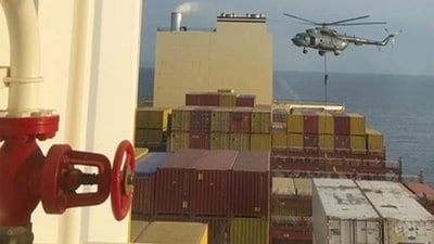 This image shows a helicopter raid targeting vessel near the Strait of Hormuz on Saturday. (AP)