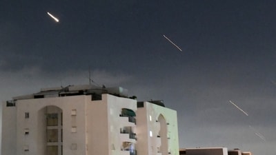 Israeli Iron Dome air defense system launches to intercept missiles fired from Iran, in central Israel, Sunday, April 14, 2024. Iran launched its first direct military attack against Israel on Saturday. (AP) Israeli Iron Dome air defense system launches to intercept missiles fired from Iran, in central Israel, Sunday, April 14, 2024. Iran launched its first direct military attack against Israel on Saturday. (AP)