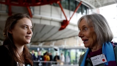 Swedish climate campaigner Greta Thunberg talks with Rosmarie Wydler-Walti, of the Swiss elderly women group Senior Women for Climate Protection (REUTERS)
