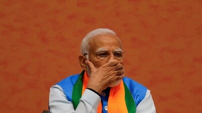 PM Narendra Modi presented copies of the manifesto to representatives of four key groups—Gareeb, Yuva, Annadata, and Nari Shakti (GYAN)—who benefit from government schemes.&nbsp; (REUTERS)