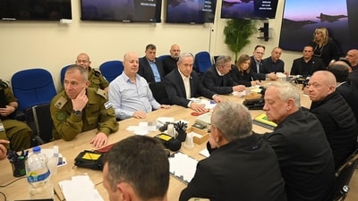 Benjamin Netanyahu (C) during a War Cabinet meeting at the Kirya in Tel Aviv. (AFP) Benjamin Netanyahu (C) during a War Cabinet meeting at the Kirya in Tel Aviv. (AFP)