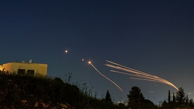 Israel's Iron Dome anti-missile system intercepts rockets launched from Lebanon towards Israel over the Israeli Lebanese border, as seen from northern Israel, April 12, 2024. (Reuters)