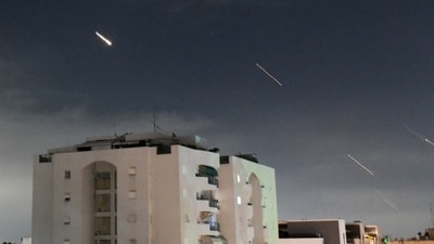 Israeli Iron Dome air defense system launches to intercept missiles fired from Iran, in central Israel, Sunday, April 14, 2024. (AP) Israeli Iron Dome air defense system launches to intercept missiles fired from Iran, in central Israel, Sunday, April 14, 2024. (AP)