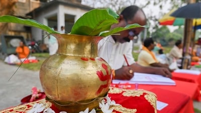 Rituals being performed on the occasion of Bengali New Year, outside the Laxminarayan temple, in Agartala on Sunday. (PTI) Rituals being performed on the occasion of Bengali New Year, outside the Laxminarayan temple, in Agartala on Sunday. (PTI)