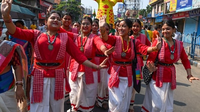 People take part in a procession to celebrate Bengali New Year, 'Poila Baishakh', in Kolkata on Sunday. (PTI) People take part in a procession to celebrate Bengali New Year, 'Poila Baishakh', in Kolkata on Sunday. (PTI)