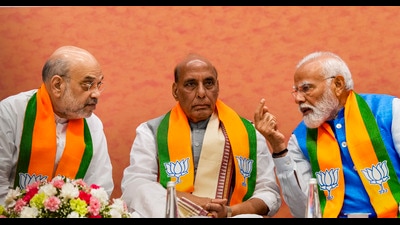 Prime Minister Narendra Modi, Defence Minister Rajnath Singh and Union Home Minister Amit Shah on Sunday. (PTI) Prime Minister Narendra Modi, Defence Minister Rajnath Singh and Union Home Minister Amit Shah on Sunday. (PTI)