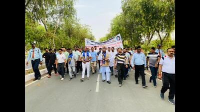 Staff and students of BBAU taking part in Bhim Walk. (HT) Staff and students of BBAU taking part in Bhim Walk. (HT)